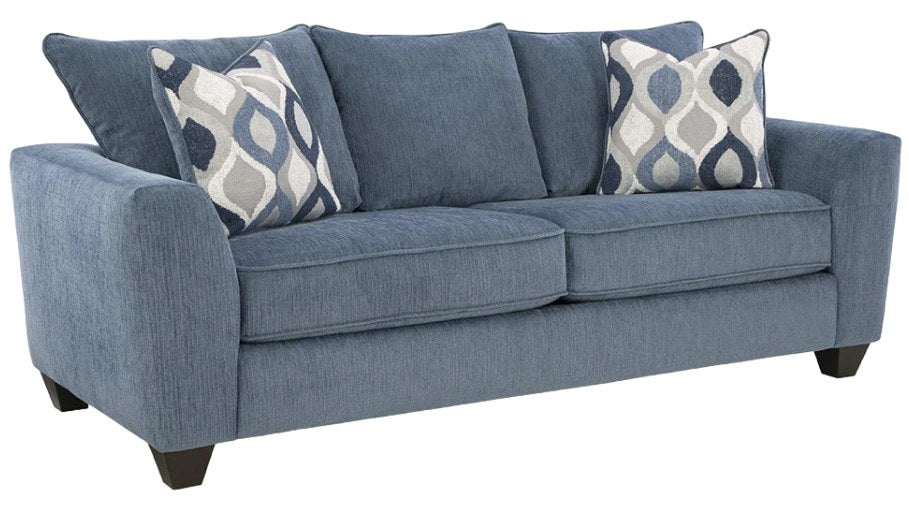 {'index': 1, 'type': 'main', 'description': 'Front-angle studio shot of the Albany denim blue fabric sofa, showcasing its texture and patterned accent pillows.'}