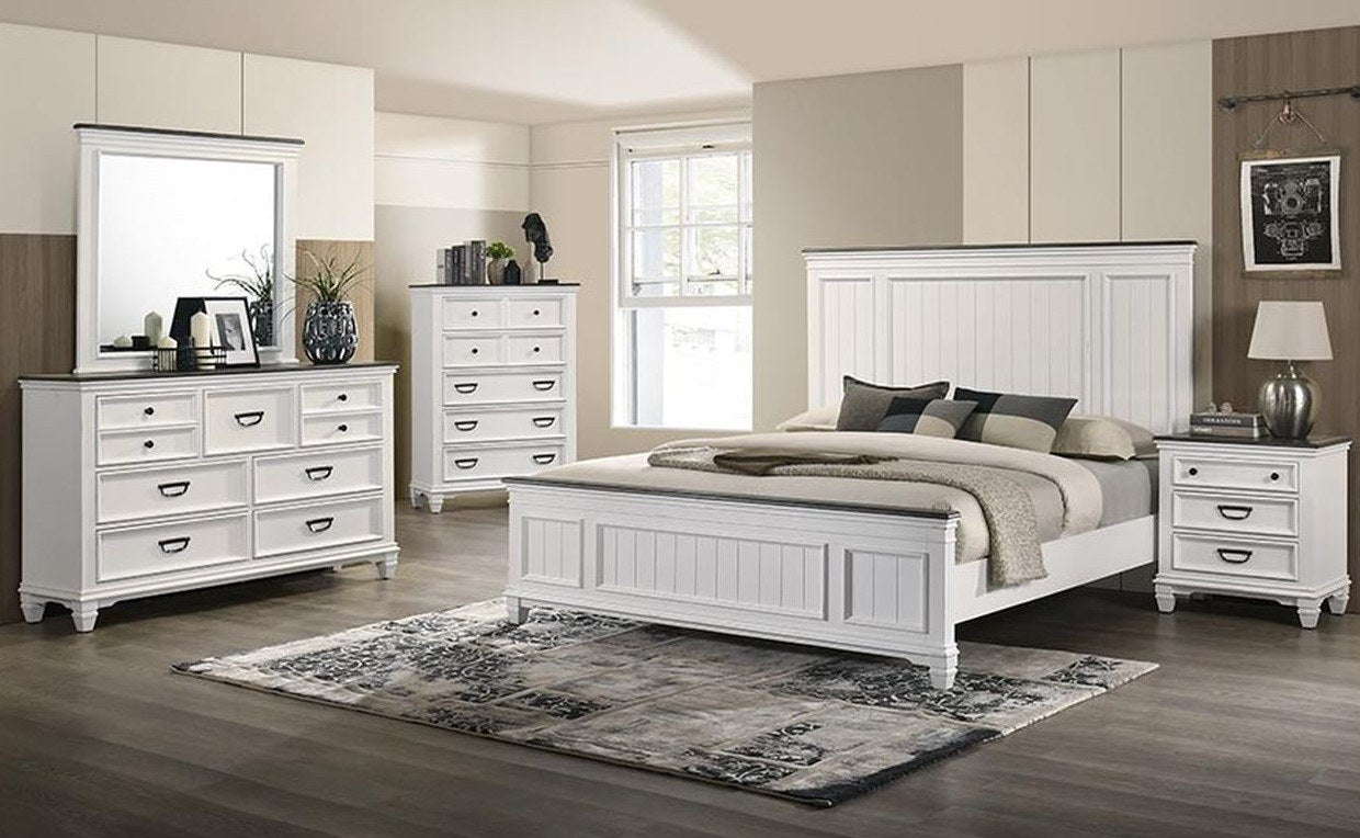 White and grey Fure nightstand with two drawers, part of a full bedroom set including a matching bed, dresser, and chest in a tastefully decorated room.
