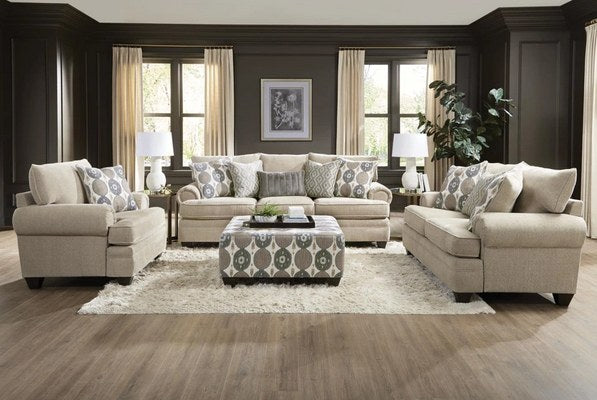 {'index': 1, 'type': 'main', 'description': 'Central view of the complete sofa and ottoman, showcasing the elegant fabric and accent pillows in a warmly styled living room.'}