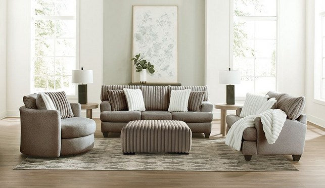 {'index': 4, 'type': 'main', 'description': 'A clear, front-facing full view of the Albany OTTO ottoman, prominently showcasing its distinctive ribbed channel tufting and low-profile feet.'}